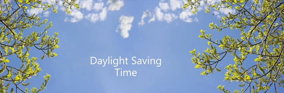 Daylight Saving Time (DST). Blue sky with white clouds and clock. Turn time f Foto stock
