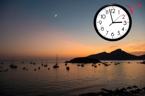 Daylight Saving Time (DST). Blue sky with white clouds and clock. Turn time f Stock Photos