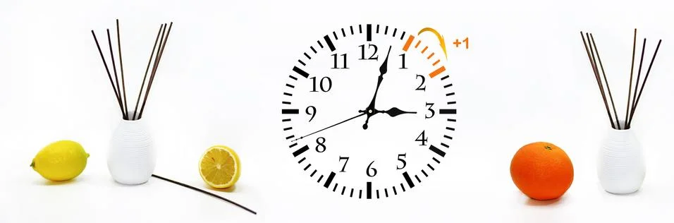 Daylight Saving Time. DST. Wall Clock going to winter time. Stock Photos