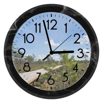 Daylight Saving Time. DST. Wall Clock going to winter time. Turn time forward Stock Photos