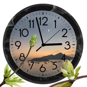 Daylight Saving Time (DST). Wall Clock going to summer time (+1). Turn time f Stock Photos
