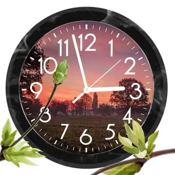 Daylight Saving Time (DST). Wall Clock going to summer time (+1). Turn time f Stock Photos