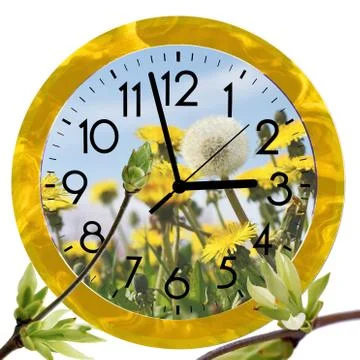 Daylight Saving Time (DST). Wall Clock going to summer time (+1). Turn time f Stock Photos