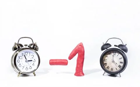 Daylight Saving Time. Wall Clock going to winter time. Autumn abstraction. Stock Photos