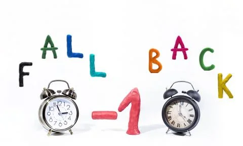 Daylight Saving Time. Wall Clock going to winter time. Autumn abstraction. Stock Photos