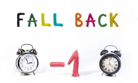 Daylight Saving Time. Wall Clock going to winter time. Autumn abstraction. Stock Photos