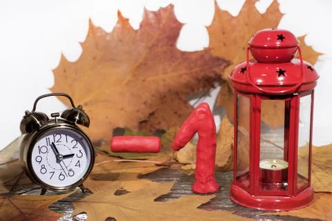 Daylight Saving Time. Wall Clock going to winter time. Stock Photos