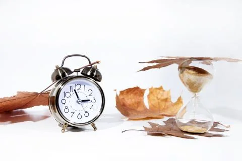 Daylight Saving Time. Wall Clock going to winter time. Autumn abstraction. Foto stock