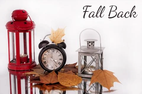 Daylight Saving Time. Wall Clock going to winter time. Autumn abstraction. Stock Photos