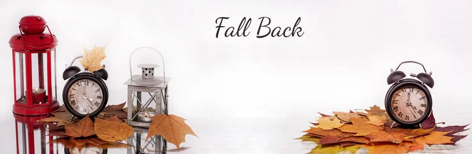 Daylight Saving Time. Wall Clock going to winter time. Autumn abstraction. Stock Photos