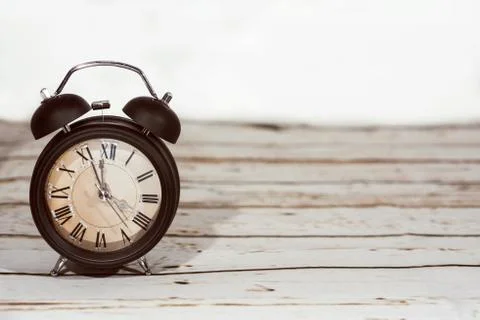 Daylight Saving Time. Wall Clock going to winter time. Autumn abstraction. Stock Photos