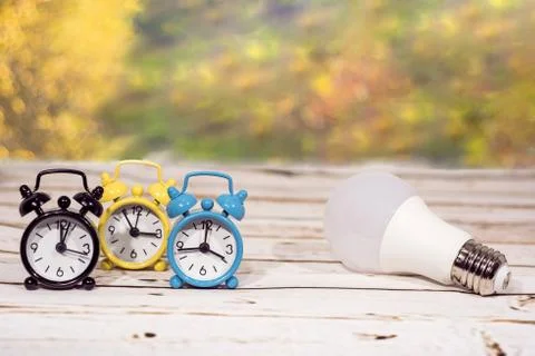 Daylight Saving Time. Wall Clock going to winter time. Autumn abstraction. Stock Photos