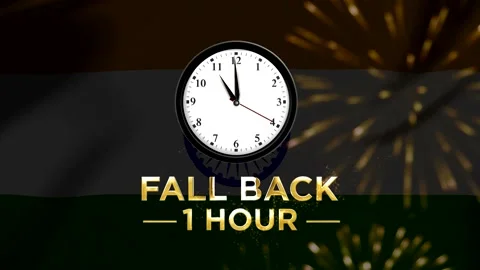 Daylight savings time change concept with a classic wall clock and gold text Stock Footage 346542486
