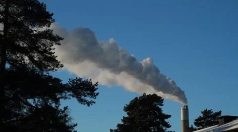 Daylight Steam from chimney stack against sky Stock Footage 59112891