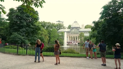 Daylight summer time lapse at Retiro Park Glass Castle, Madrid Spain Stock Footage 136683328