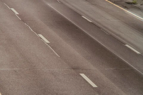 Daylight time lapse of rush hour, cars streak by, 2592x1728 Stock Footage 52896054