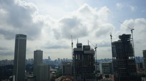 Daylight timelapse Of Cloud, Traffic and Crane Moving In South Beach, Singapore Stock Footage 38177446