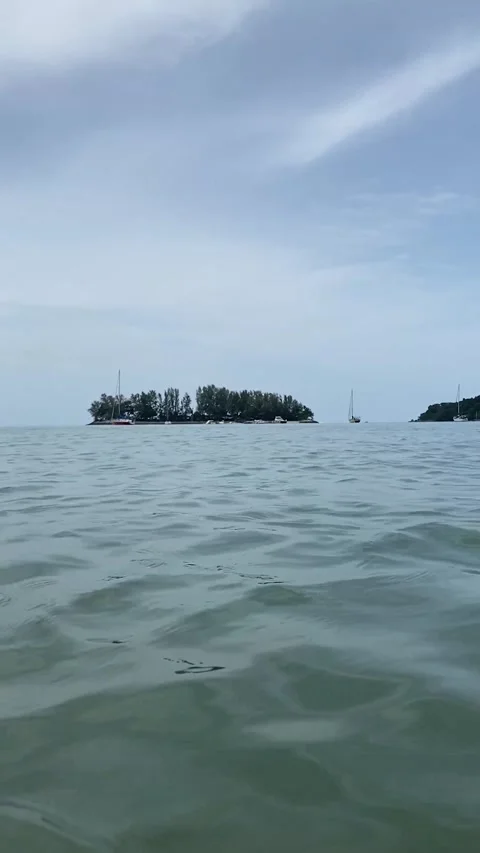 Daylight wind small wave on ocean sea water near the beach at straits of Mela Stock Footage 222695454