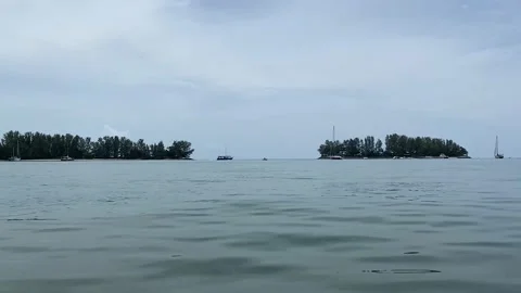 Daylight wind small wave on ocean sea water near the beach at straits of Mela Stock Footage 222695459