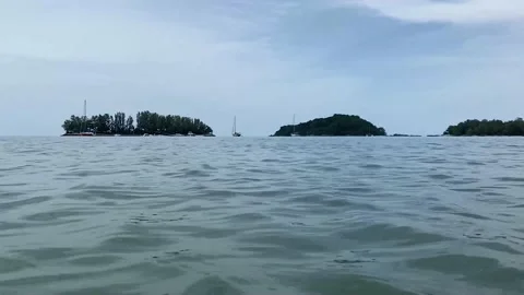 Daylight wind small wave on ocean sea water near the beach at straits of Mela Stock Footage 222695464