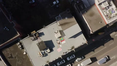 Daylit Rooftop Climate Protest Banners Above Busy Urban Street Stock Footage 345397340
