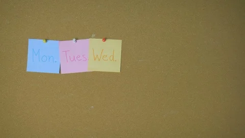 Days of week. Hands pining sticky notes on pin board funny animation Stock Footage 98864774