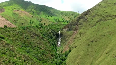 Daytime Aerial Drone View Flying Slowly Toward Mountain Waterfall Near Sabaneta Stock Footage 345241419
