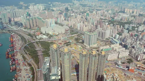 Daytime aerial time-lapse of dense urban area, Hong Kong, Kowloon, China Stock Footage 63913570