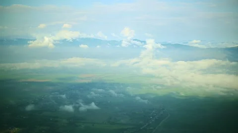 Daytime Aerial View of Clouds above a Valley Stock Footage 49130776