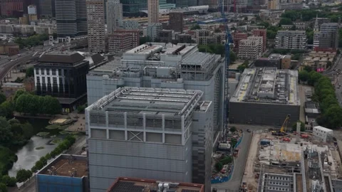 Daytime Aerial View of Data Center Campus in Evolving City Stock Footage 339052596