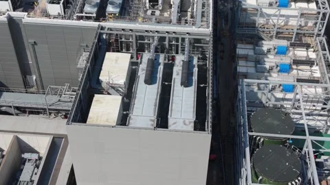 Daytime Aerial View of Modern Data Center Cooling Infrastructure Stock Footage 337527658