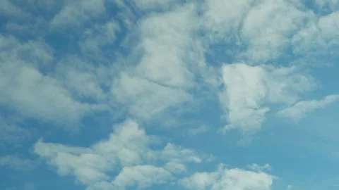 Daytime air plane window view azure sky white puffy fluffy cotton clouds sun aer Vídeo Stock 332921519