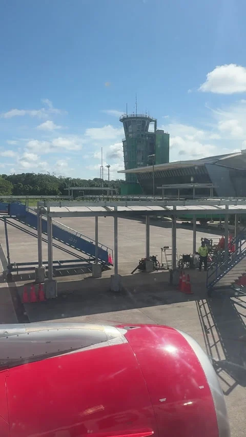 Daytime Airport Apron with Control Tower from Airplane Window Stock Footage 338020400