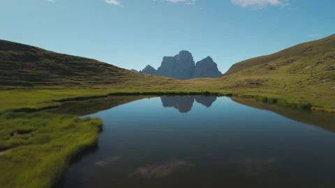 Daytime Drone Flight Over Lago delle Baste Toward Monte Pelmo Stock Footage 336835661