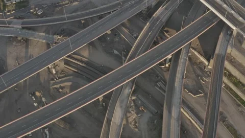 Daytime Drone Pullback Over Layered Highway Overpasses Under Construction Stock Footage 345269010