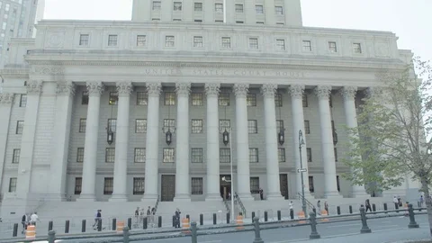 Daytime DX establishing shot CV of ND large downtown city government bldg United Vidéo 83550583