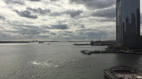 A daytime establishing shot dx view of the Statue of Liberty and Verrazano Stock Footage 68508559