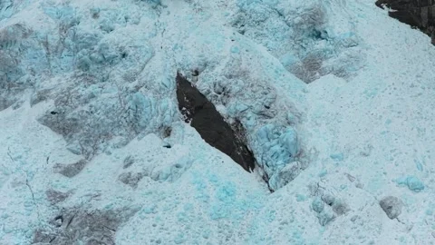 Daytime flyover of Boyabreen reveals icy Norway mountains. Stock Footage 321004971