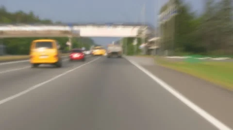 Daytime freeway driving into city with motion blur time lapse Stock Footage 25686432