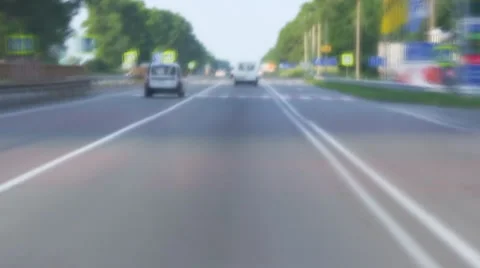 Daytime freeway driving into city with motion blur time lapse Stock Footage 25687703