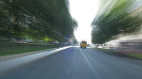 Daytime freeway driving into city with motion blur time lapse Stock Footage 40540092