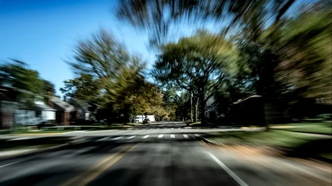 Daytime Hyper Drivelapse Through A Local Community Stock Footage 99794289