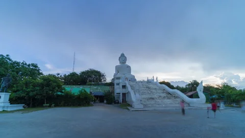 Daytime hyperlapse of the Big Buddha statue in Phuket moving right to left with Stock-Footage 317938171