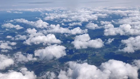 Daytime Landscape View of isolated land and floating cloud from flight window in Stock Footage 119494018