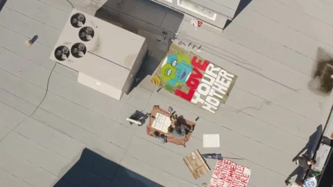 Daytime Rooftop Climate Protest Banner Painters With Love Your Mother Art Stock Footage 345397297