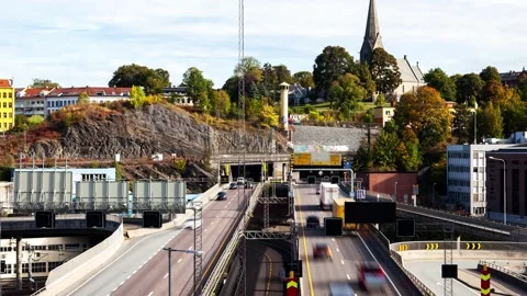 Daytime Rush Hour Traffic on Oslo Bridge Tunnel Timelapse with Church Stock Footage 308194150