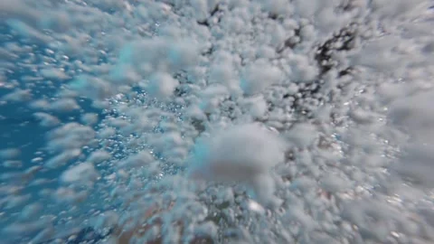 Daytime Selfie POV of Man Jumping into Villa Swimming Pool and Emerging from Stock Footage 337953311