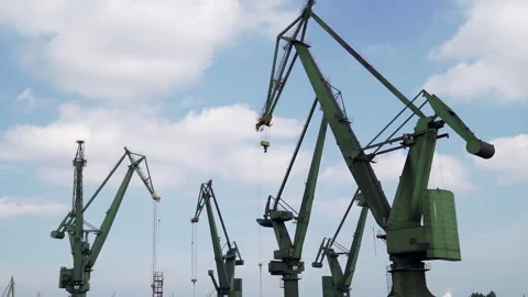 Daytime shot of cranes operating in Gdanska Shipyard Video stock 108693029