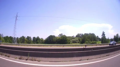Daytime side car rig driving on highway, cinematic motion travel shot - C Stock Footage 319188855