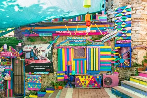 Daytime of stone cafe decorated with multicolored panels colorful stairs, and Stock Photos